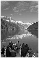Mountains reflected in fjord, seen by tour boat passengers, Northwestern Fjord. Kenai Fjords National Park, Alaska, USA. (black and white)