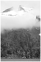 Cloud-covered peak and waterfalls, Northwestern Fjord. Kenai Fjords National Park, Alaska, USA. (black and white)
