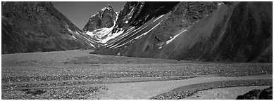 Valley with gravel bar surrounded by steep mountains. Lake Clark National Park (Panoramic black and white)