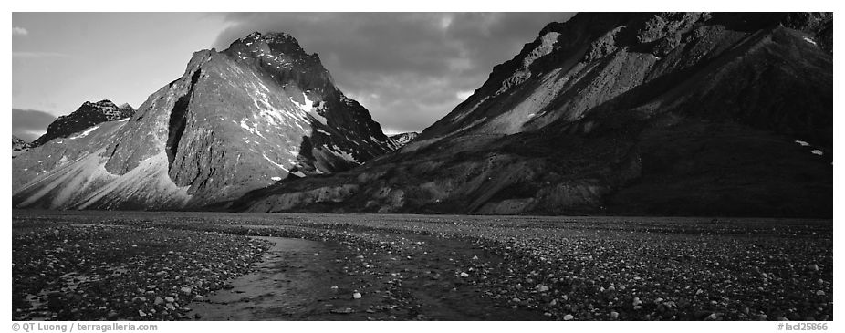 Stream, gravel bar, and mountains at sunset. Lake Clark National Park (black and white)