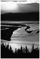 Early morning sun shining on the wide Chitina river. Wrangell-St Elias National Park, Alaska, USA. (black and white)
