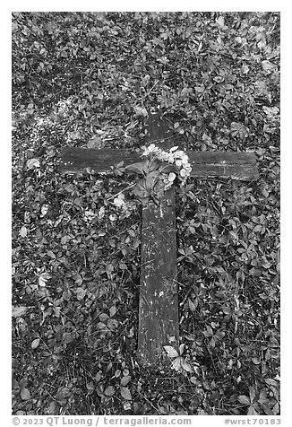 Wooden cross on the ground, Kennecott cemetery. Wrangell-St Elias National Park (black and white)