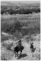 Mexican horsemen from Boquillas Village. Big Bend National Park, Texas, USA. (black and white)