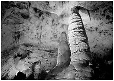 Six-story tall colum and stalagmites in Hall of Giants. Carlsbad Caverns National Park, New Mexico, USA. (black and white)