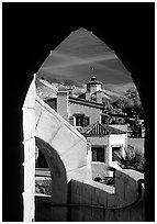 Arch framing Scotty's Castle. Death Valley National Park ( black and white)