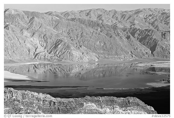 Flooded Death Valley floor at Badwater, seen from Aguereberry point, late afternoon. Death Valley National Park (black and white)