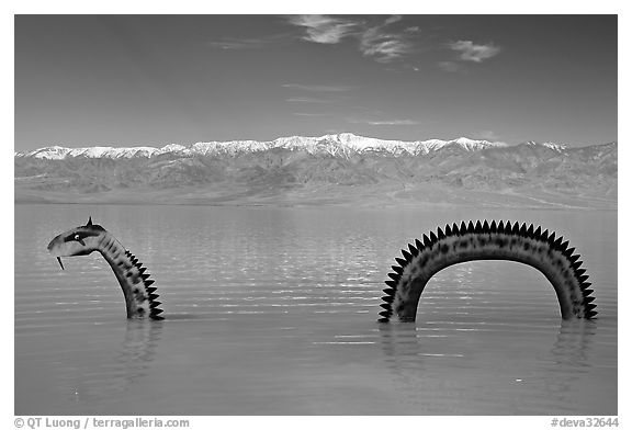 Loch Ness Monster art installation in Manly Lake and Panamint range. Death Valley National Park (black and white)