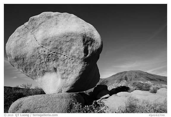 Balanced boulder and Malapai Hill. Joshua Tree National Park (black and white)