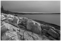 Granite slabs on coast, sunrise, Schoodic Peninsula. Acadia National Park, Maine, USA. (black and white)