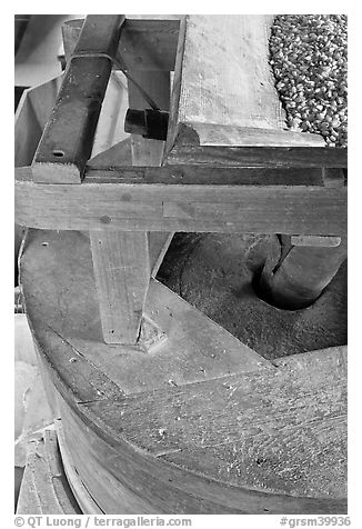 Corn being grinded into flour, Mingus Mill, North Carolina. Great Smoky Mountains National Park (black and white)