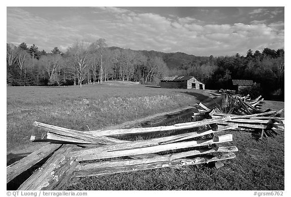 Wooden fence, pasture, and cabin, late afternoon, Cades Cove, Tennessee. Great Smoky Mountains National Park (black and white)