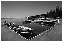 Small boats moored at marina, Rock Harbor. Isle Royale National Park ( black and white)