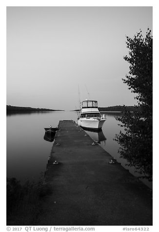 Motorboat and yacht moored at Moskey Basin dock. Isle Royale National Park (black and white)
