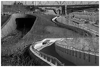 Curves of pathway and North railroad tunnel, part of Dan Kiley's landscape design. Gateway Arch National Park ( black and white)