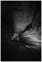 Visitors walk down path in cave. Mammoth Cave National Park ( black and white)