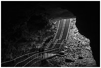 Visitors walk out of cave via historic entrance. Mammoth Cave National Park ( black and white)