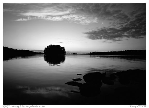 Kabetogama lake sunset with tree-covered islet. Voyageurs National Park (black and white)