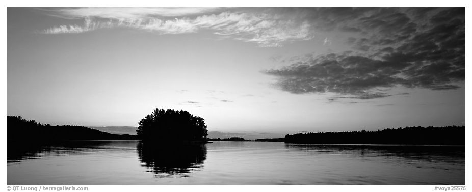North woods tree-covered isled at sunset. Voyageurs National Park (black and white)