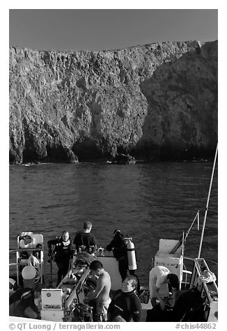 Dive boat and cliffs, Annacapa Island. Channel Islands National Park, California, USA.