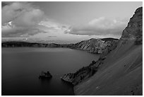 Phantom ship and lake seen from Sun Notch, sunset. Crater Lake National Park, Oregon, USA. (black and white)