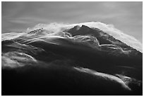 Cloudcap over backlit Mt Scott summit. Crater Lake National Park, Oregon, USA. (black and white)