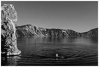 Man swimming in lake, Cleetwood Cove. Crater Lake National Park ( black and white)