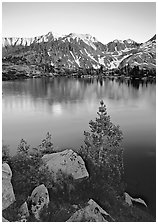 Boulders, tree, and Woods Lake at sunset. Kings Canyon National Park, California, USA. (black and white)