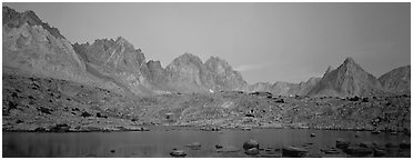 Pink light on High Sierra and lake at twilight. Kings Canyon  National Park (Panoramic black and white)