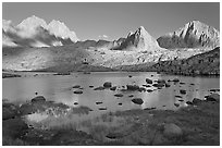 North Palissade, Isocele Peak and Mt Giraud reflected in lake, Dusy Basin. Kings Canyon National Park, California, USA. (black and white)
