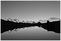 Mountain range reflected in calm lake, Dusy Basin. Kings Canyon National Park ( black and white)