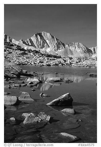 Mt Giraud reflected in a lake in Dusy Basin, morning. Kings Canyon National Park, California, USA.