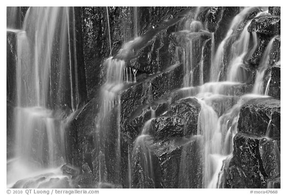 Waterfall over columns of cooled lava. Mount Rainier National Park (black and white)
