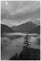 Diablo Lake, fog, and moon, dawn, North Cascades National Park Service Complex. Washington, USA. (black and white)