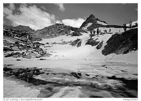 Monarch lake half-frozen in early summer. Sequoia National Park (black and white)