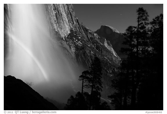 Upper Yosemite Falls with double moonbow and Half-Dome. Yosemite National Park, California, USA.