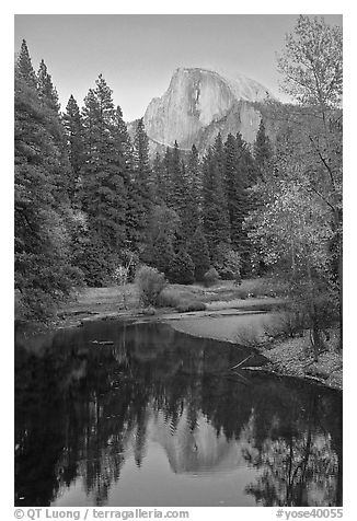 Half Dome reflected in Merced River at sunset. Yosemite National Park (black and white)
