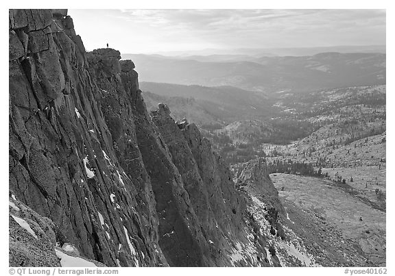 Cliffs on  North Face of Mount Hoffman with hiker standing on top. Yosemite National Park (black and white)