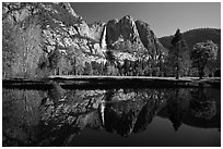Yosemite Falls and meadow reflected in a seasonal pond. Yosemite National Park, California, USA. (black and white)