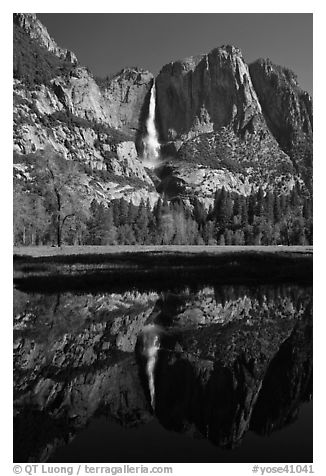 Yosemite Falls and meadow reflected in run-off pond, morning. Yosemite National Park (black and white)