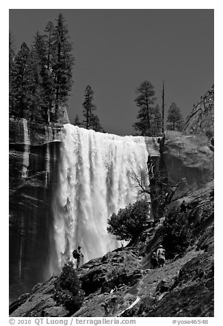 Hikers standing on Mist Trail below Vernal Fall. Yosemite National Park (black and white)