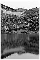 Last light on peak reflected in Vogelsang Lake. Yosemite National Park, California, USA. (black and white)