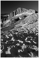 Neve with sun cups on the Sierra Crest, and North Peak. Yosemite National Park, California, USA. (black and white)