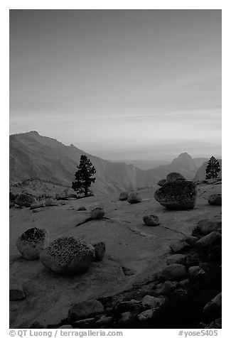 Glacial erratics, pine trees, Clouds rest and Half-Dome from Olmstedt Point, sunset. Yosemite National Park (black and white)