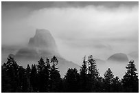 Half-Dome, clearing smoke. Yosemite National Park ( black and white)