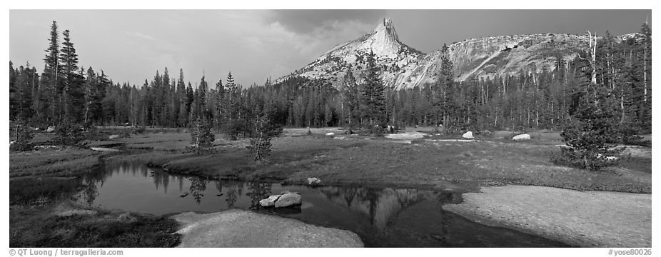 Stream and Cathedral Peak in storm light. Yosemite National Park (black and white)