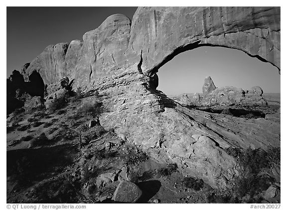 Windows with view of Turret Arch from opening. Arches National Park (black and white)