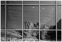 Cliffs, Visitor Center window reflexion. Arches National Park, Utah, USA. (black and white)