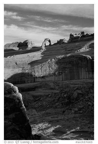 Delicate Arch atop steep cliff. Arches National Park (black and white)