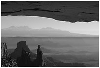 Mesa Arch, pinnacles, La Sal Mountains, early morning, Island in the sky. Canyonlands National Park ( black and white)