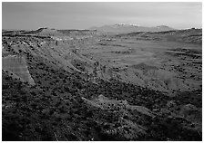 Cliffs, basin, and snowy mountains at dusk, Upper Desert, dusk. Capitol Reef National Park ( black and white)